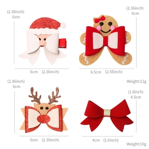 Christmas hair clips set featuring Santa, reindeer, gingerbread man, and red bows for girls