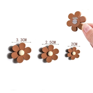 Mini brown daisy flower fridge magnets in three sizes with round magnetic backing