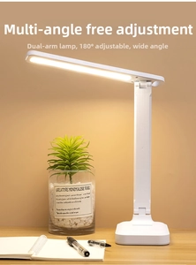 Adjustable LED desk lamp with 180° dual-arm folding mechanism on a modern wooden desk
