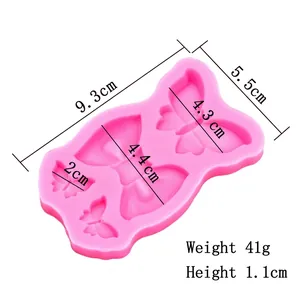 Moule en silicone rose avec motifs de papillons et nœuds pour décorations de gâteaux fondant