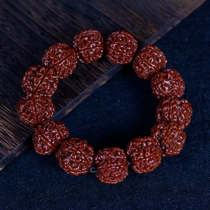 Handcrafted Nepal five-petal Rudraksha bodhi seed bracelet with 12 natural textured beads