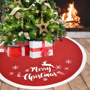 Red knit Christmas tree skirt featuring Merry Christmas text, reindeer and snowflake embroidery