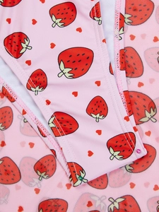 Detailed macro view of pink strawberry and heart print mesh fabric for women bikini