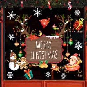 Macro detail of festive Christmas window stickers with snowman, reindeer and snowflake motifs