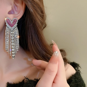 Luxurious heart tassel earrings with pink rhinestones and long silver fringe drop