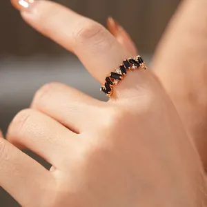 Irregular golden ring with square black zircons and micro diamonds for women