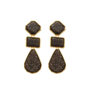 Vintage gold geometric drop earrings with brown resin stone pendants on white background