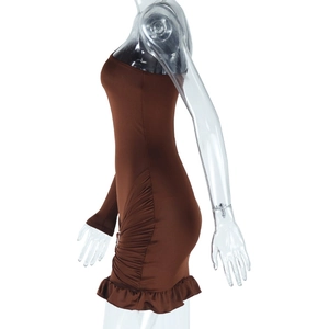 Detail of brown one-shoulder mini dress featuring ruffled hem and bodycon fit