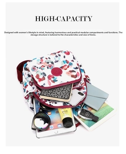 Detailed interior of a floral nylon backpack showing large storage for iPad and accessories