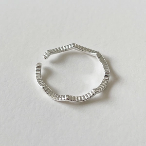 Minimalist S925 sterling silver adjustable wave ring with a geometric textured finish