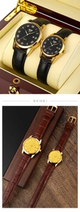 Detailed macro view of SKMEI 9058 quartz couple watches with leather straps and date display