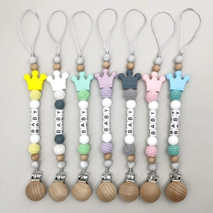 Silicone and beech wood baby pacifier clips in 7 colors with BABY letter beads