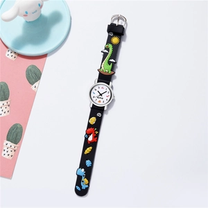 Close-up of black silicone strap with cartoon dinosaur patterns and white dino dial face