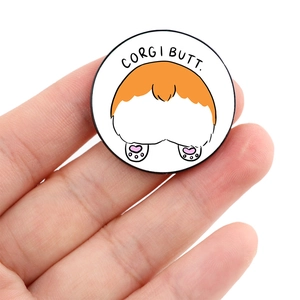 Cute enamel Corgi Butt pin with cartoon illustration and Corgi Butt text design