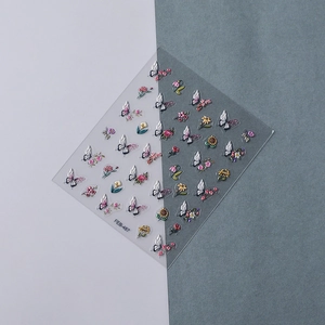 Macro shot of 3D embossed nail stickers FEB-487 with gradient butterflies and flowers