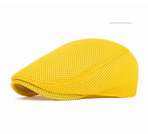 Detail of breathable yellow mesh flat cap showing the lightweight summer cooling texture