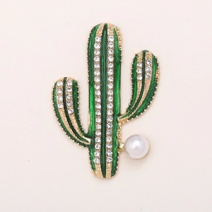 Exquisite green enamel cactus charm with golden metal edges and sparkling rhinestones