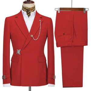 Detail of red business suit with double-breasted metal buttons and matching trousers