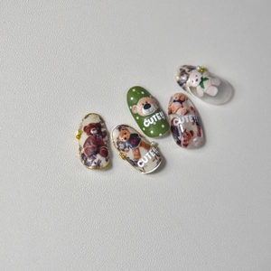 Embossed 3D teddy bear nail art stickers with cute pearls and green accents