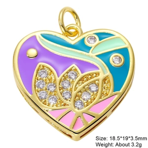 Detail of a copper heart pendant with colorful enamel and cubic zirconia inlay