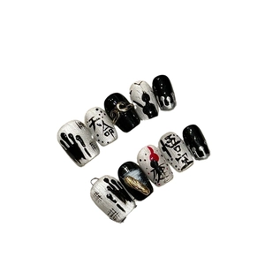 Handmade Black Myth Wukong press-on nails featuring ink calligraphy and golden staff art