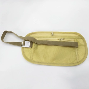 Detail view of yellow nylon anti-theft waist bag with adjustable elastic strap and buckle