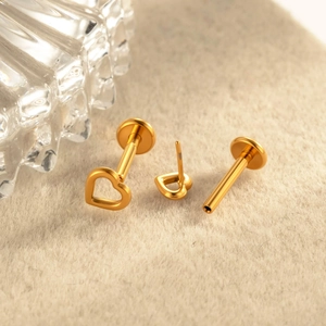 Classic golden F136 titanium labret studs with hollow heart design and push-pin backing