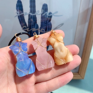 Three crystal gemstone necklaces featuring wire-wrapped female torso pendants in gold mesh