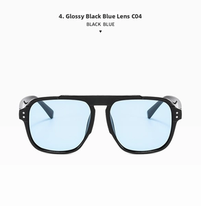 Detailed front view of black frame sunglasses with transparent blue lenses and metal rivets