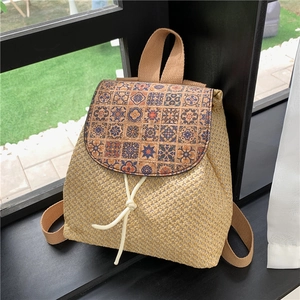 Summer straw bucket backpack with vintage printed lid and fringe drawstring closure