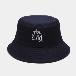 Detail of navy blue cotton bucket hat with white be Kind heart embroidery