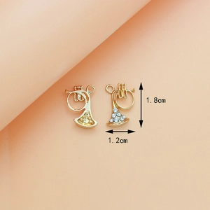 Detail showing gold French horn charms with rhinestones and 1.8cm size measurement