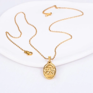 Detail of gold cupid angel relief pendant with adjustable lobster clasp and link chain