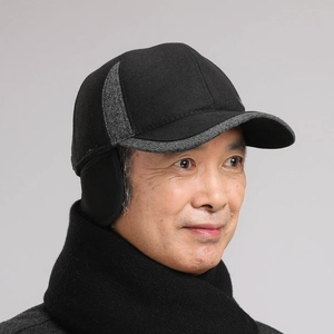 Side view of men's winter baseball cap with gray patchwork and foldable ear flaps