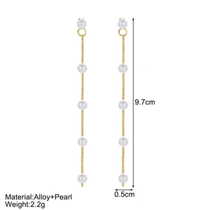 Detail showing pearl heart drop earrings with dimensions and material specs