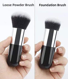 Comparison of fluffy powder brush and dense foundation brush with sleek capsule handle