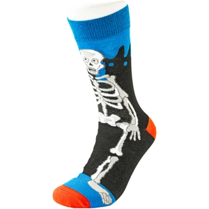 Detailed knit texture of colorful skeleton skull socks in blue, black and orange