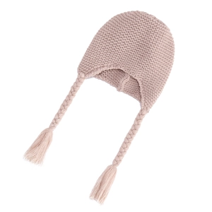 Detail showing knit texture and braided tassels of a dusty pink baby trapper hat