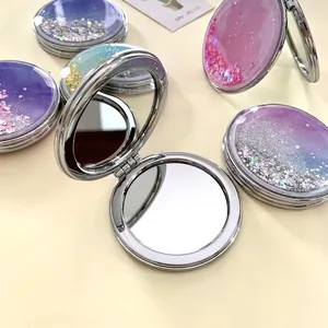 Foldable quicksand makeup mirror with silver metal frame and glitter gradient finish