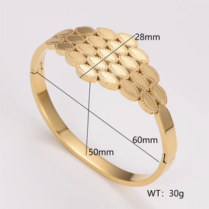 Detailed view of honeycomb textured gold stainless steel bangle with dimensions and weight