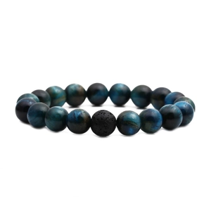 Blue tiger eye beaded bracelet with a single black lava rock stone on white background