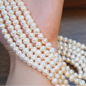 Elegant multi-strand S925 sterling silver necklace featuring natural freshwater pearls