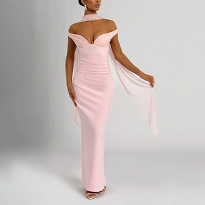 Pink strapless evening gown with pleated texture and matching tulle shawl detail