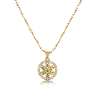 Golden Tree of Life round necklace with green and clear zircon stones on white base