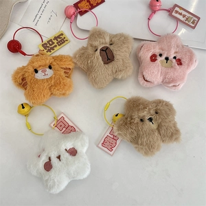 Detailed view of colorful plush star keychains with animal embroidery and cute charms