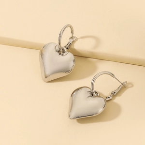 S925 silver needle heart-shaped hoop earrings with a polished metallic finish