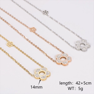 Sparkling diamond-set flower pendant necklace in gold, rose gold and silver finishes