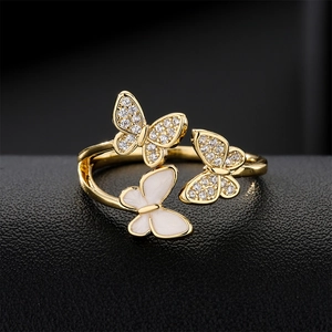 Gold plated butterfly open ring with micro-set cubic zirconia and white enamel
