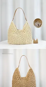 Detail view of woven straw tote bag interior fitting a smartphone with leather strap