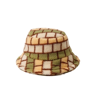 Green and beige checkered lamb wool bucket hat with thick plush texture for winter
